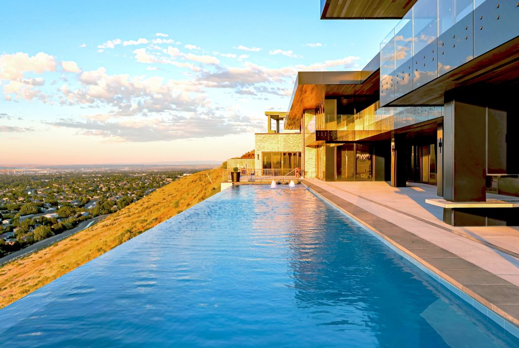 Southridge residence with a pool terrace overlooking an expansive landscape.